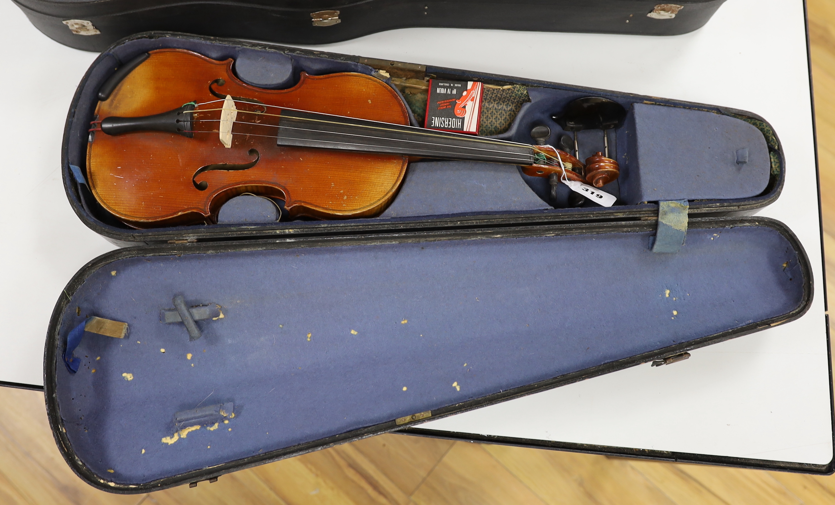 A cased 3/4 sized student violin marked Dresden, with reproduction Stradivarius label